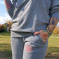 Embrace Body Love Logo Genderless Fleece Sweatpants- Embroidered, pink logo